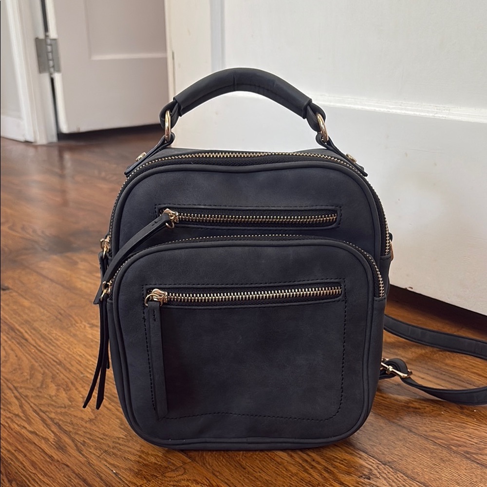 Chic Black Backpack with Gold Accents